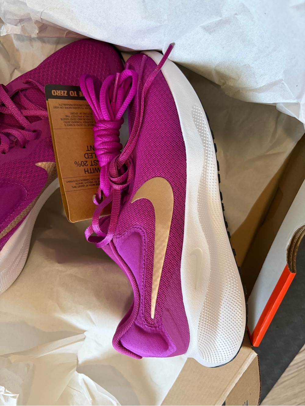 Nike Women's Hot Pink Running Sneakers with Gold Swoosh